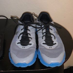 Blue and Gray Under Armor Running Shoes